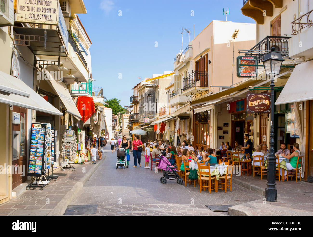 The tourist street with cozy cafes and souvenir shops where tourists ...