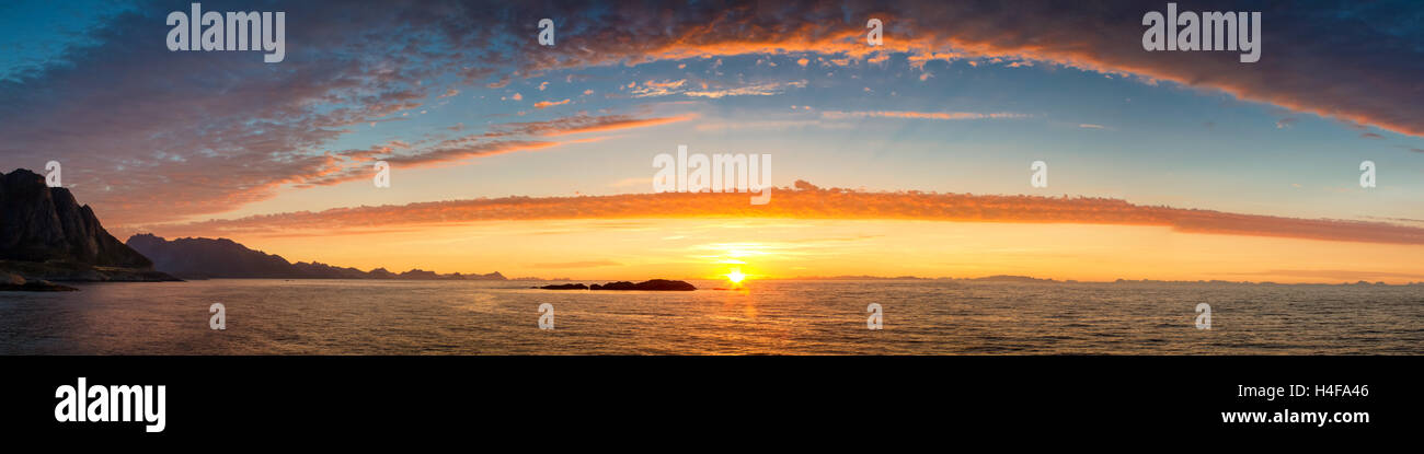 Panorama of a beautiful sunrise over the Lofoten, Norway Stock Photo