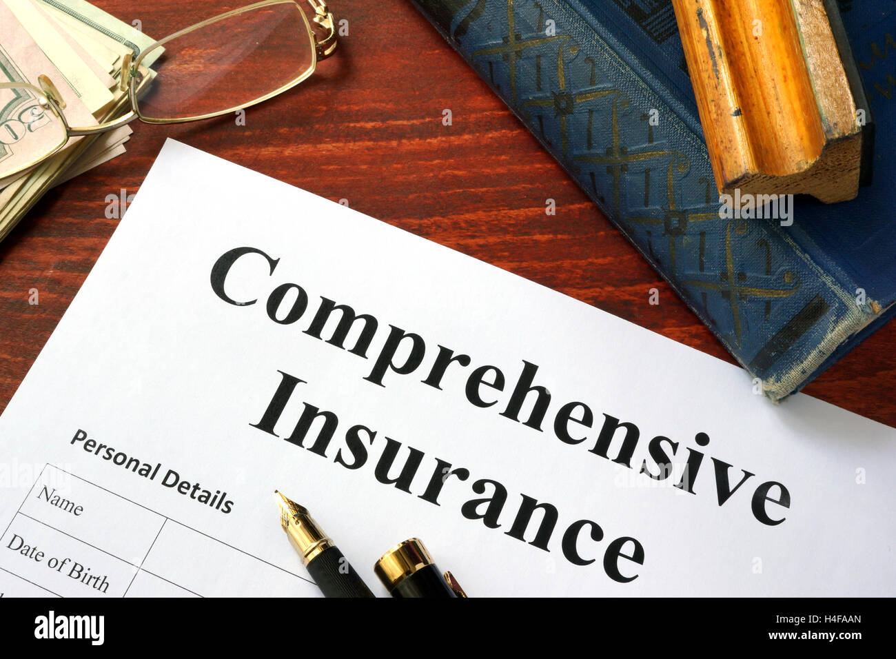 Comprehensive insurance form on a office table. Stock Photo