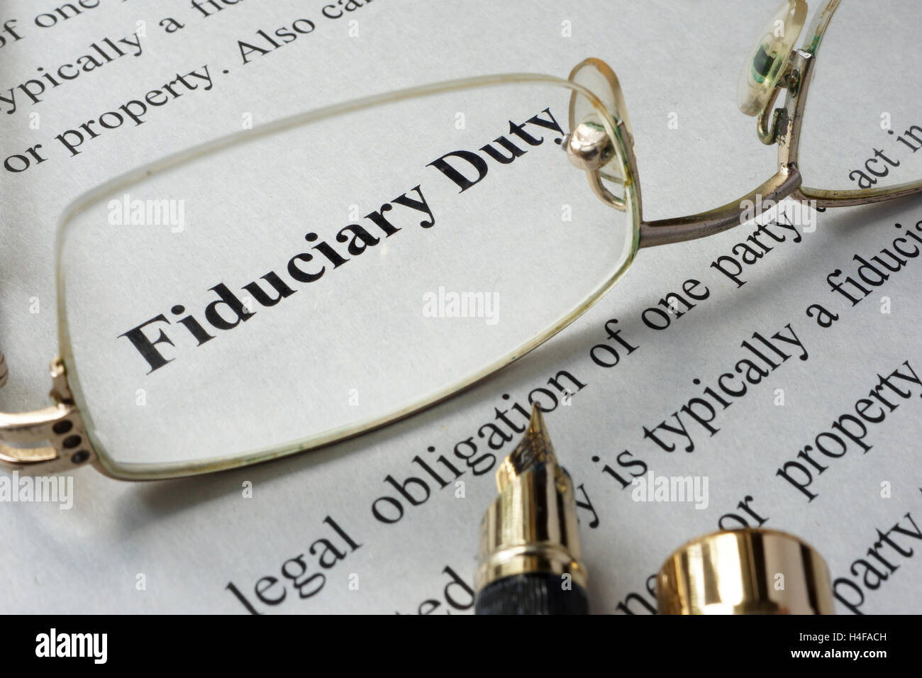 Fiduciary duty concept written on a paper. Stock Photo