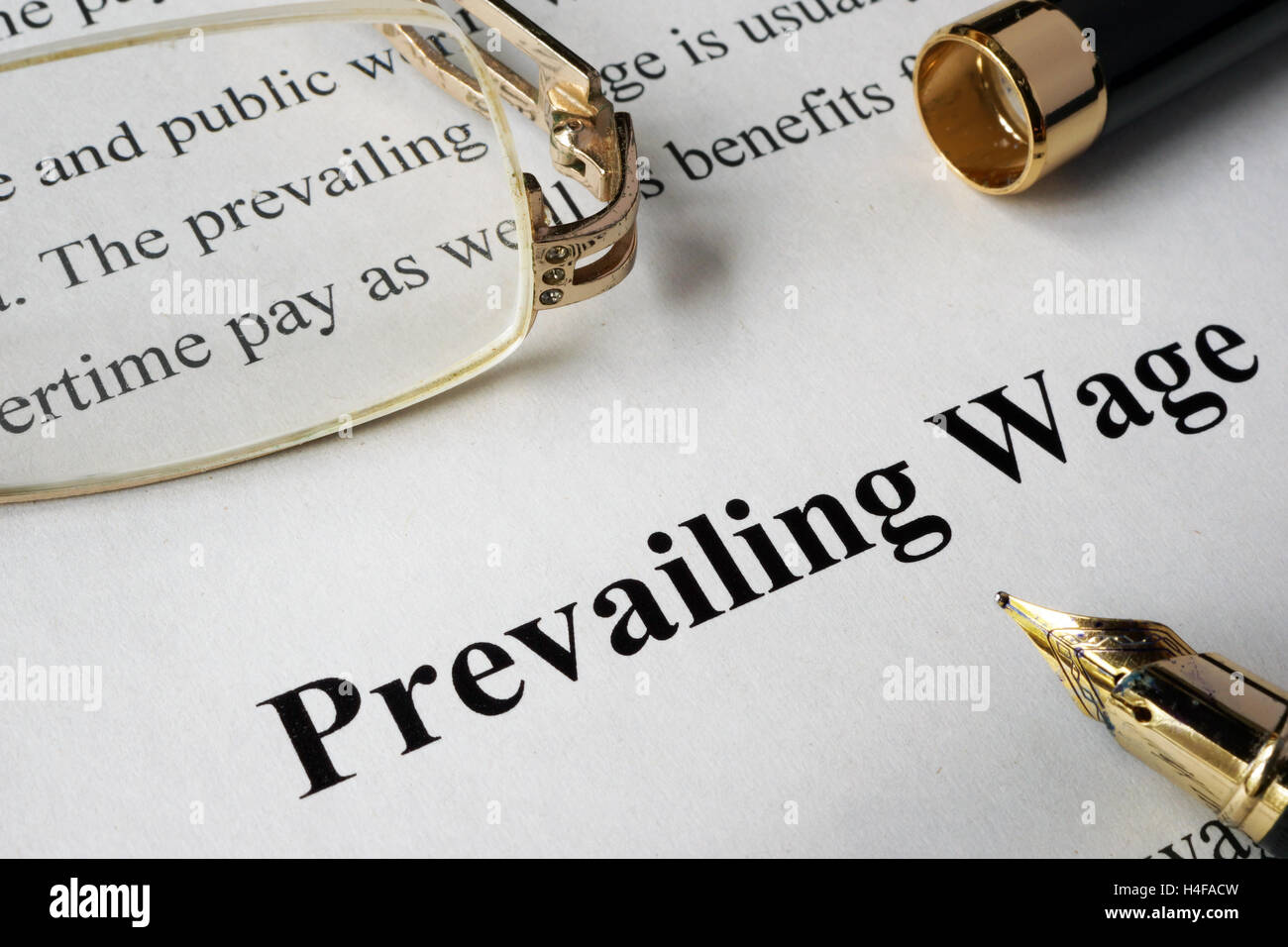 Prevailing wage concept written on a paper. Stock Photo