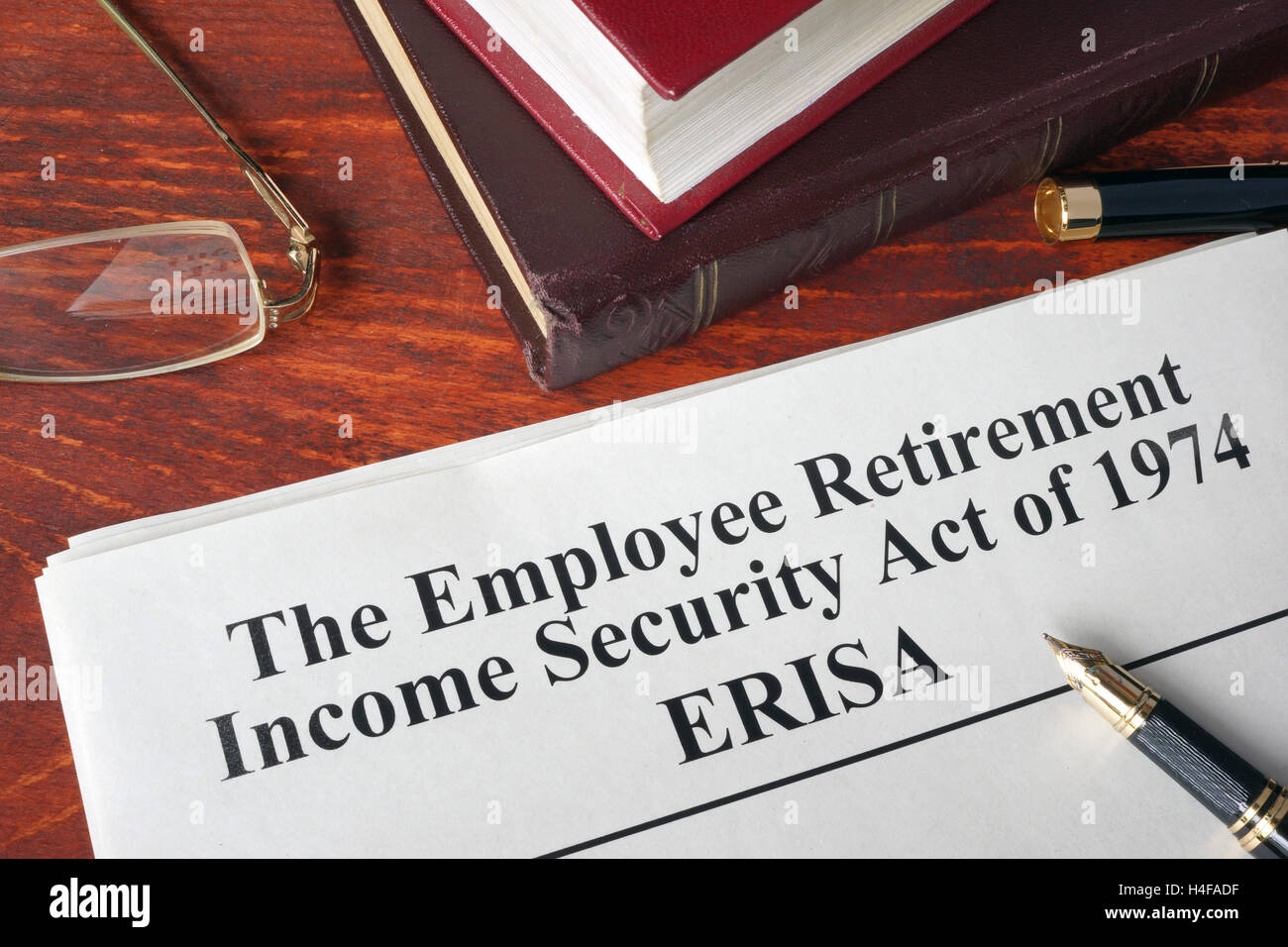 ERISA The Employee Retirement Income Security Act of 1974  on a table. Stock Photo