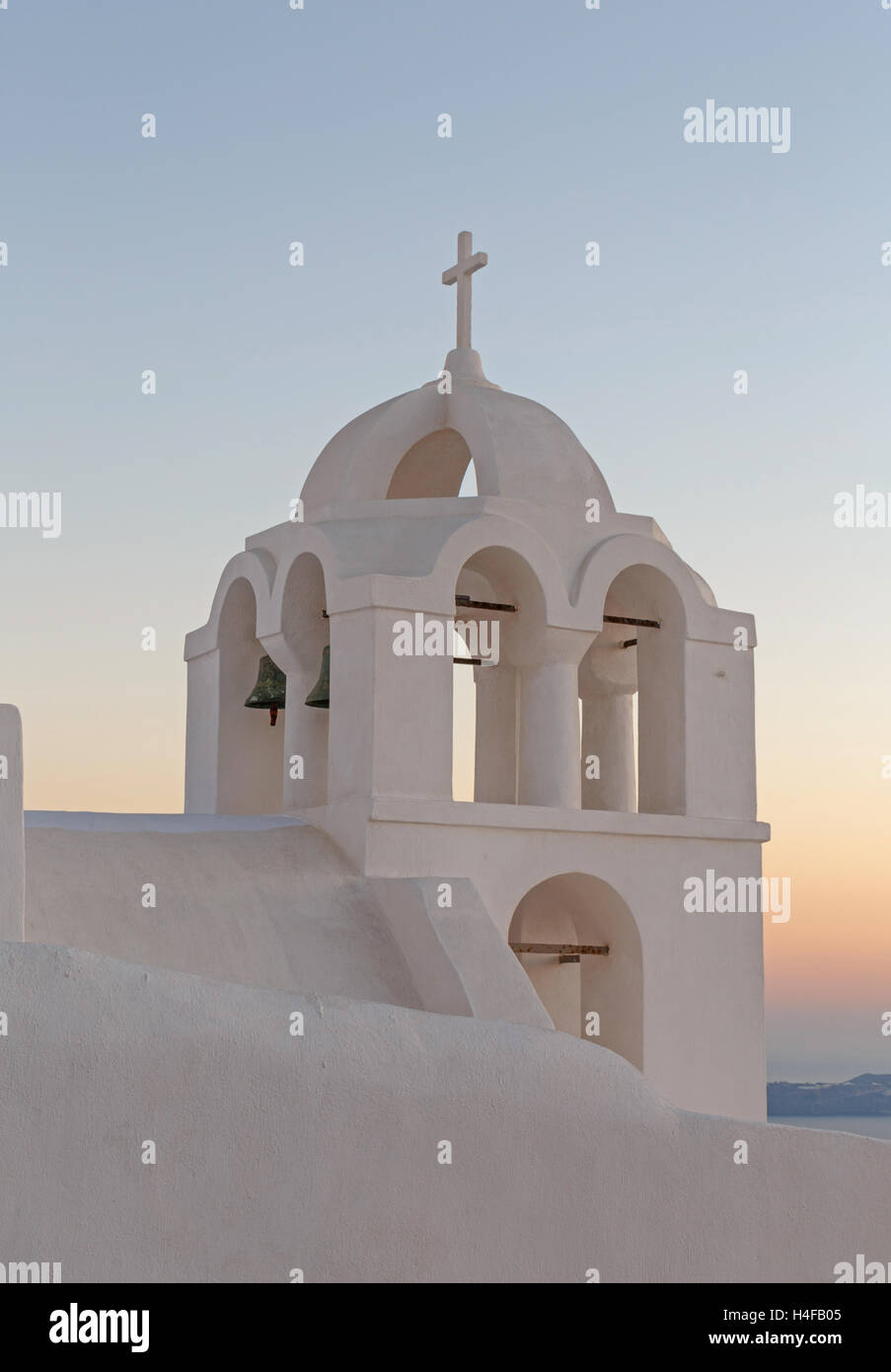 tower bell of Agios Minas church in Fira at sunset Stock Photo