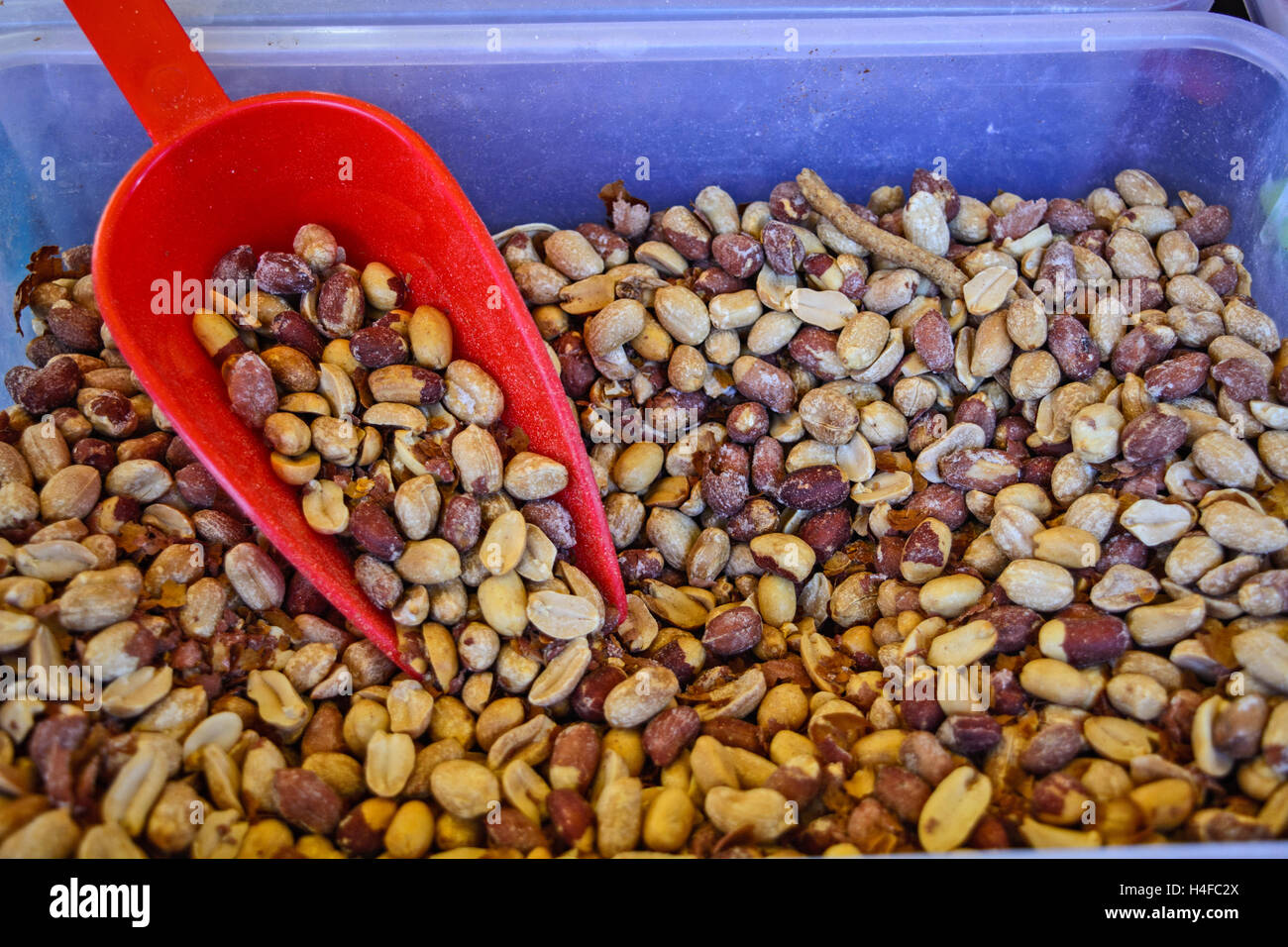 Sales of fresh and tasty peanut in the market. Stock Photo