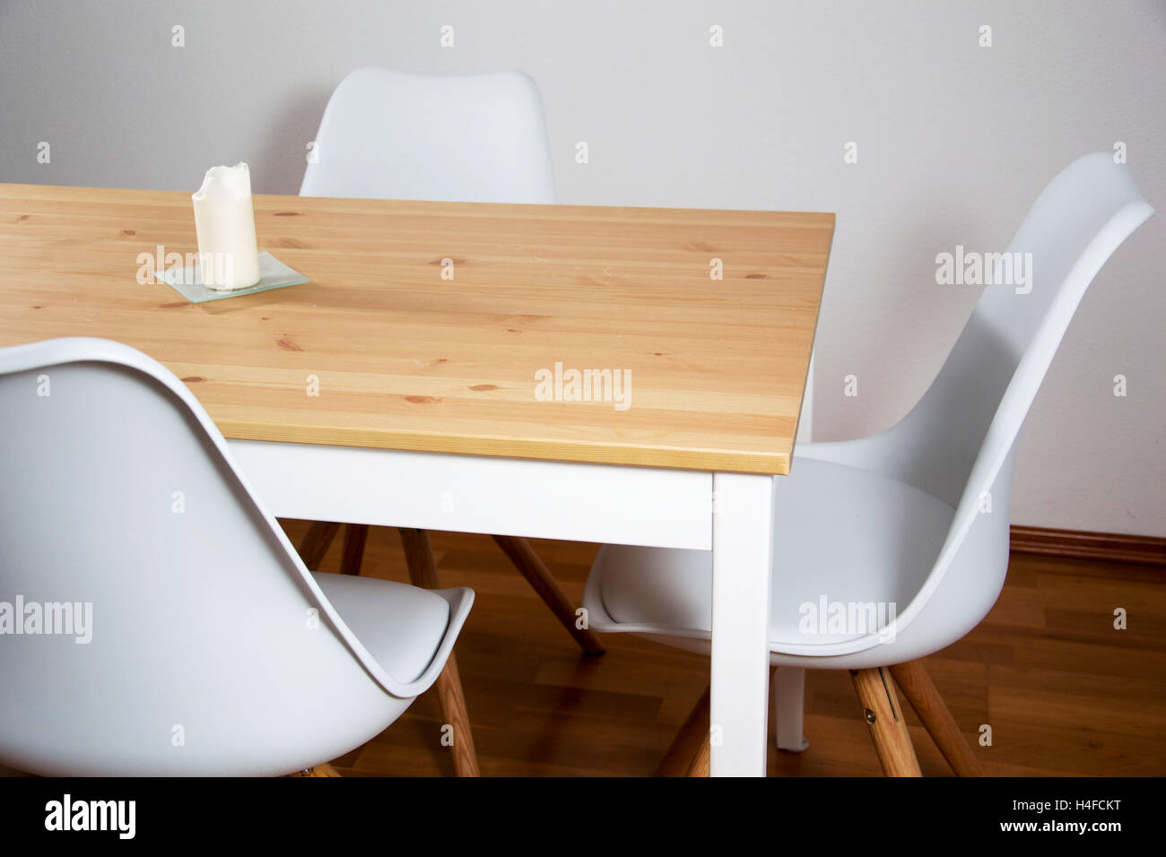 dining table with white chairs Stock Photo - Alamy