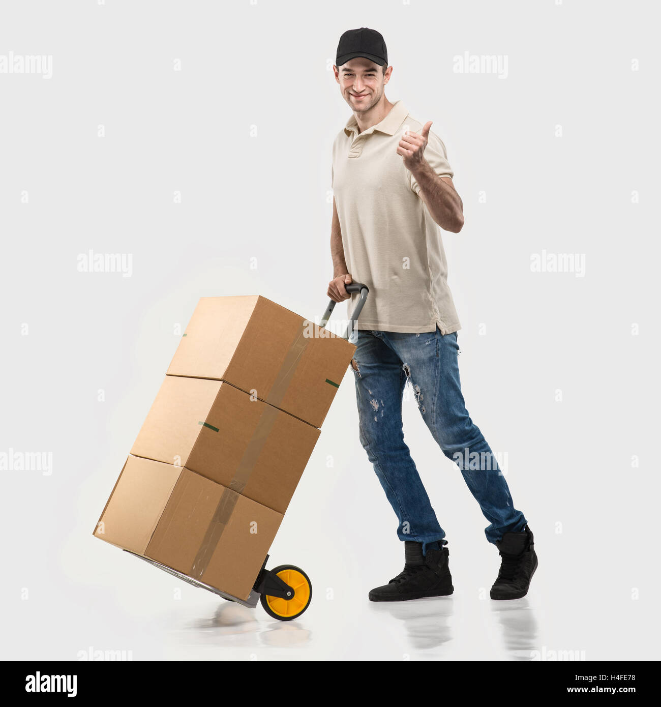 Courier - a handcart packages Stock Photo