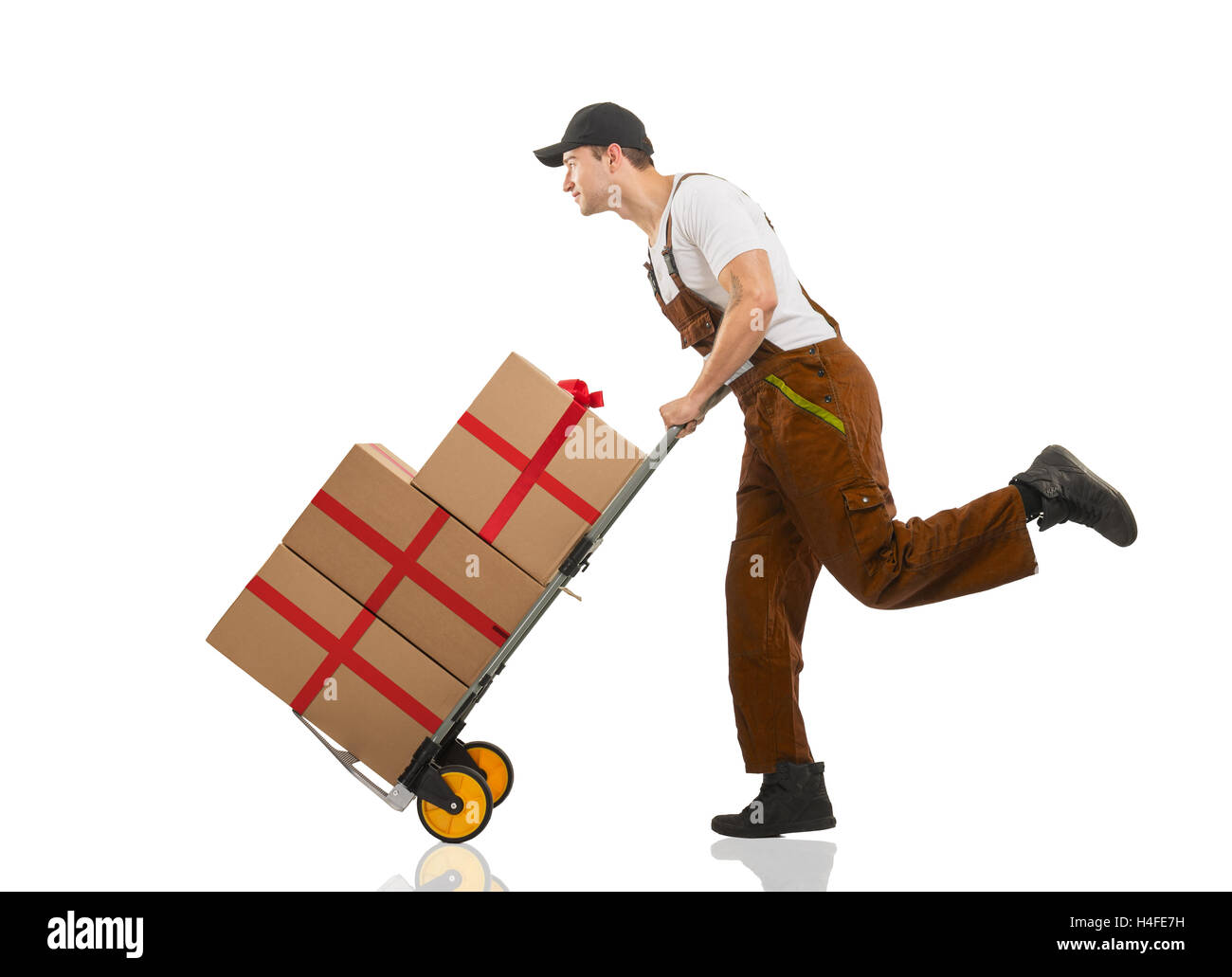 Courier runs - the trolley: packages and gifts Stock Photo