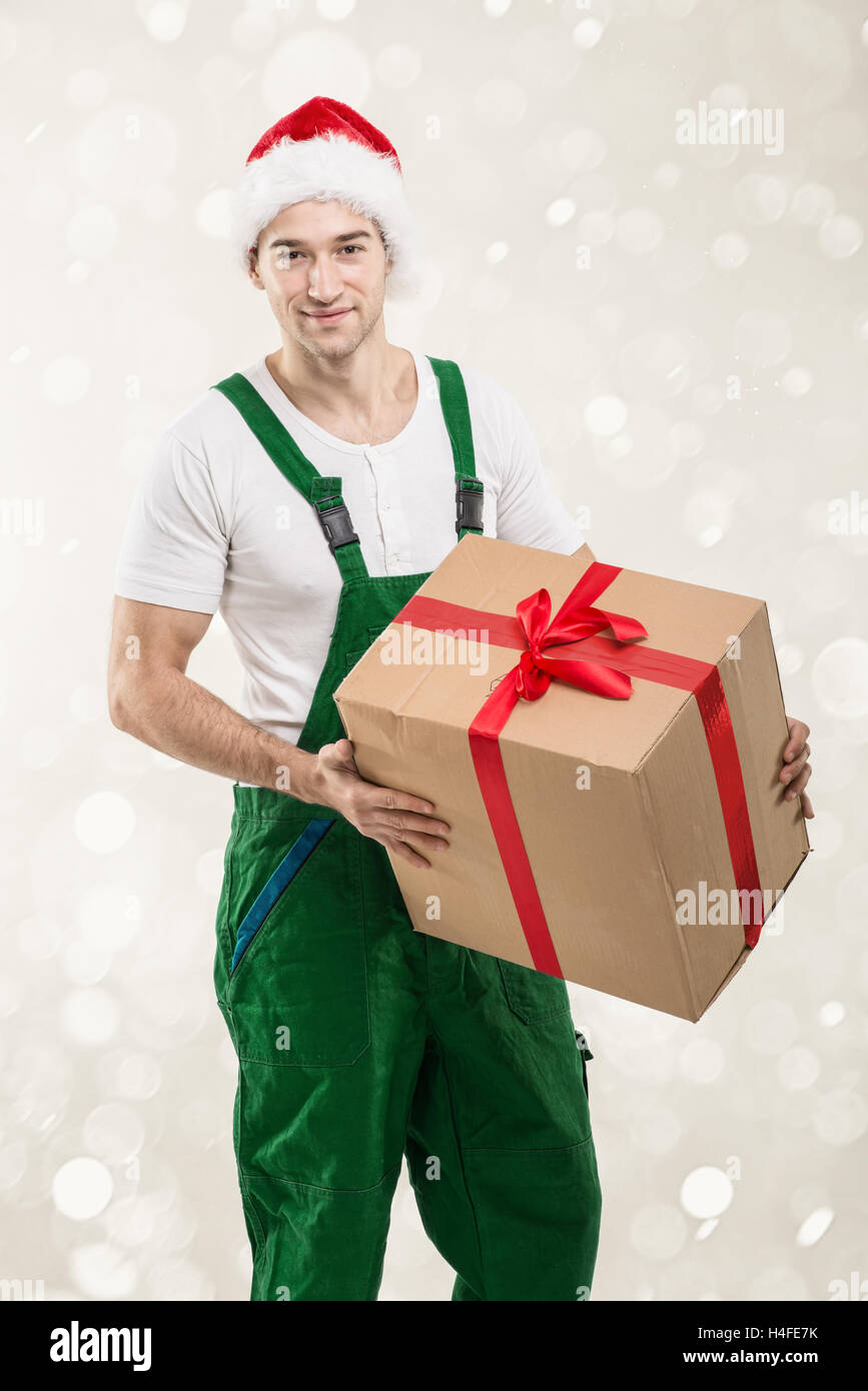 Courier - In the hands of boxes, gift Stock Photo