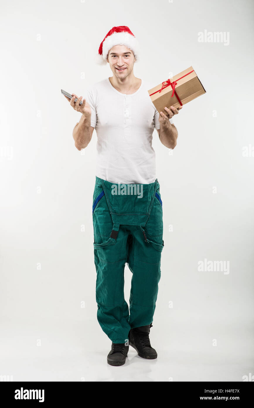 Courier - A hand box, gift and phone Stock Photo
