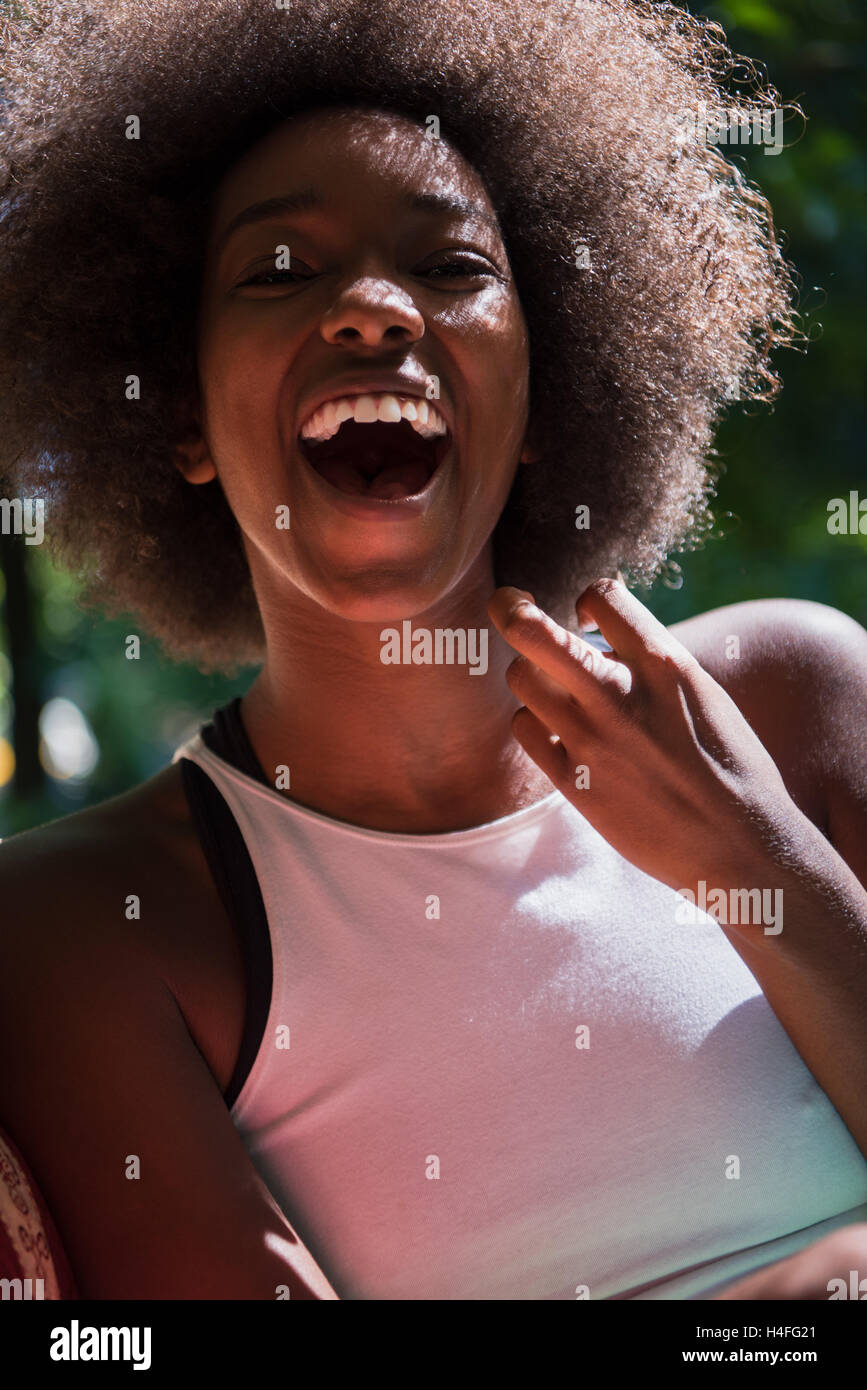 Close up portrait of a beautiful young african american woman smiling ...