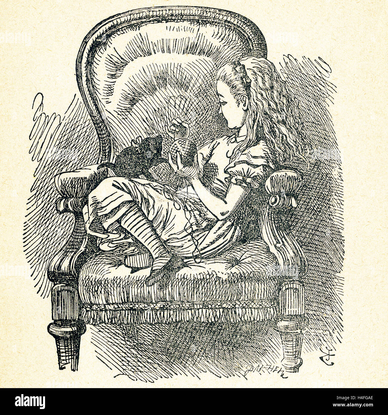 This illustration of Alice sitting with a black cat in a chair in the house is from 'Through the Looking-Glass and What Alice Found There' by Lewis Carroll (Charles Lutwidge Dodgson), who wrote this novel in 1871 as a sequel to 'Alice's Adventures in Wonderland.' The black cat here is 'Kitty,' the kitten of Dinah, Alice's cat in the Wonderland novel. Stock Photo