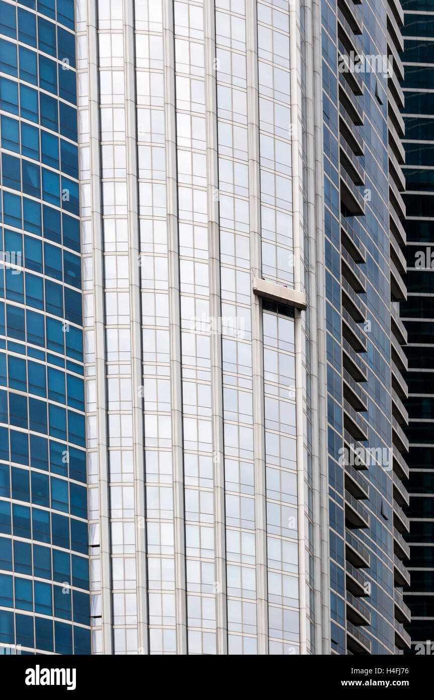 A cleaning cradle on the side of a tall building in Chicago, USA. Stock Photo