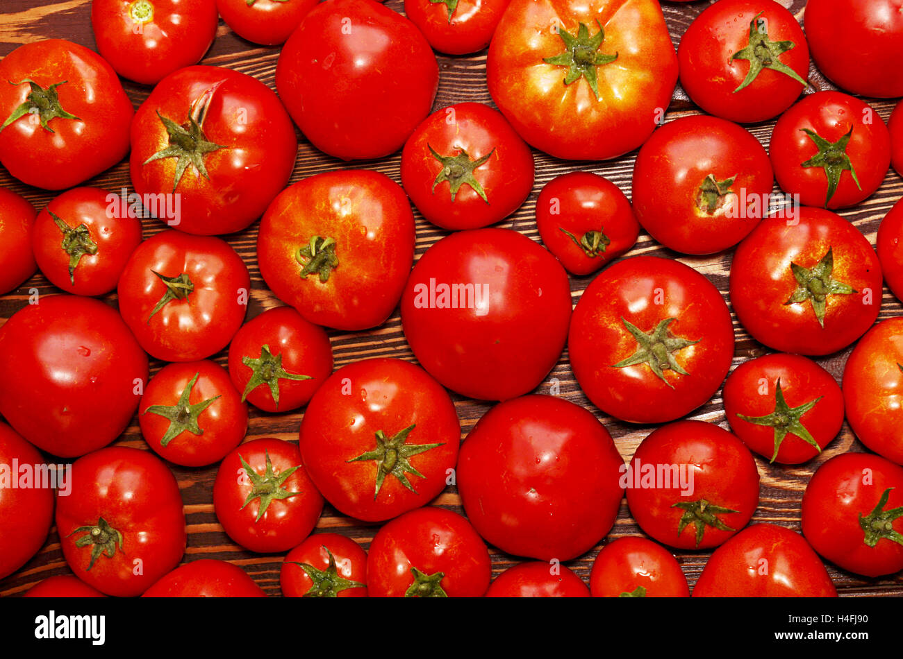Background of group fresh ripe organic tomatoes Stock Photo - Alamy