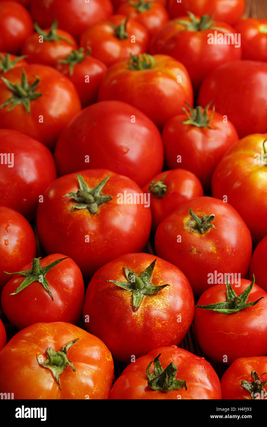 Background of group fresh ripe organic tomatoes Stock Photo - Alamy