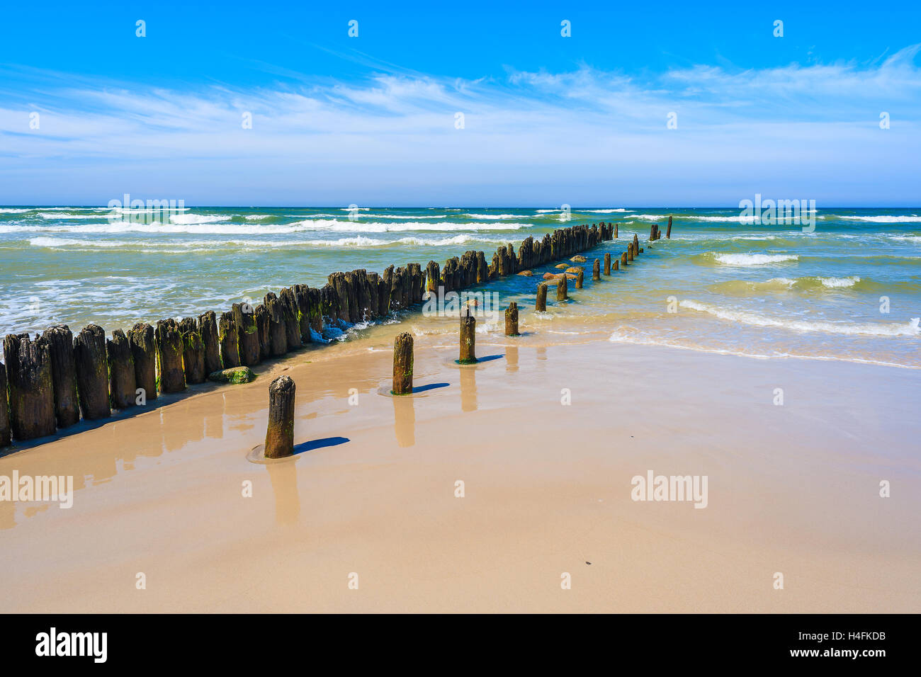 A view of beautiful beach with breakwaters in Debki village, Baltic Sea, Poland Stock Photo