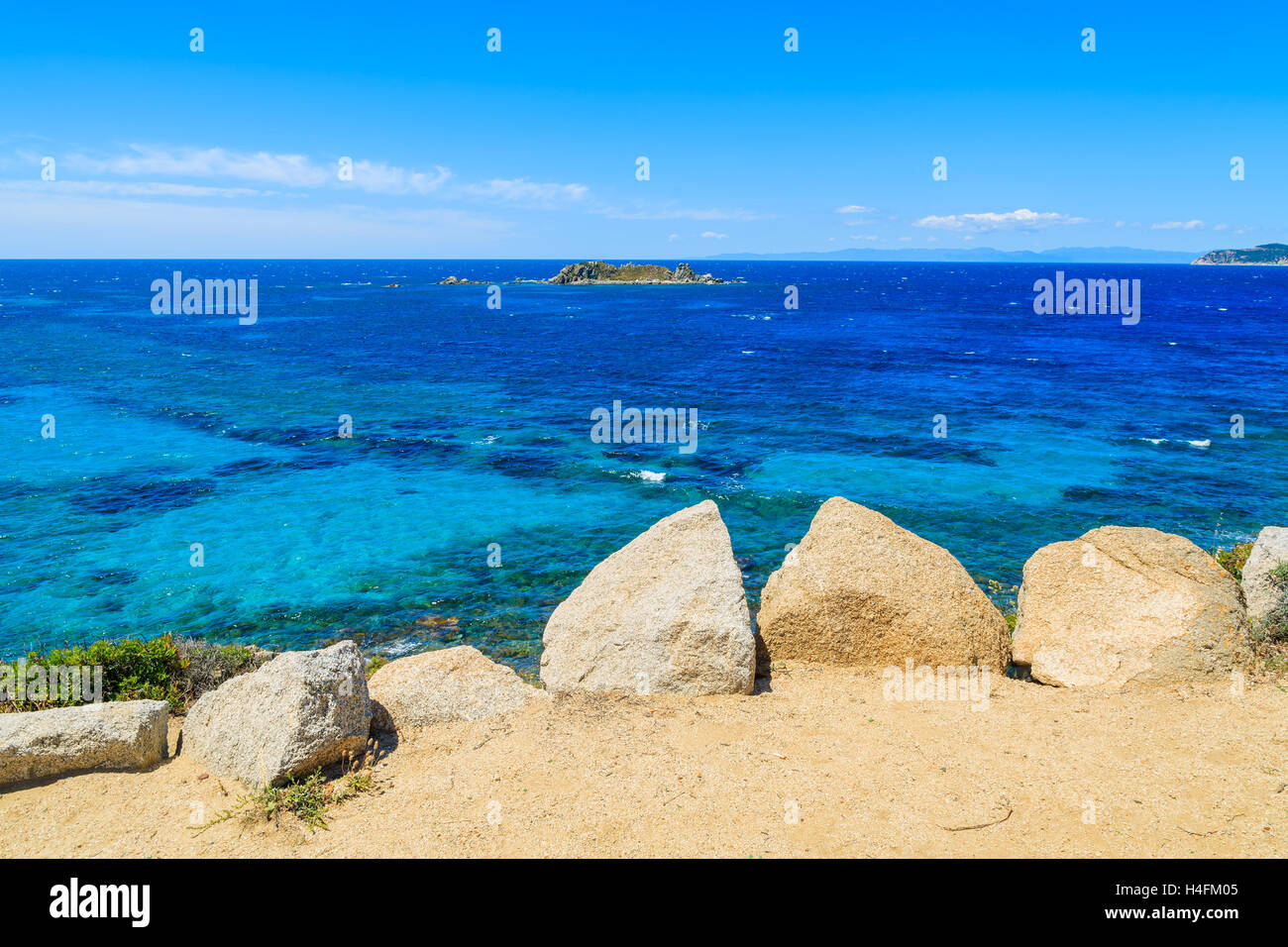 Rocks on coast Sardinia island and endless sea water view, Italy Stock Photo