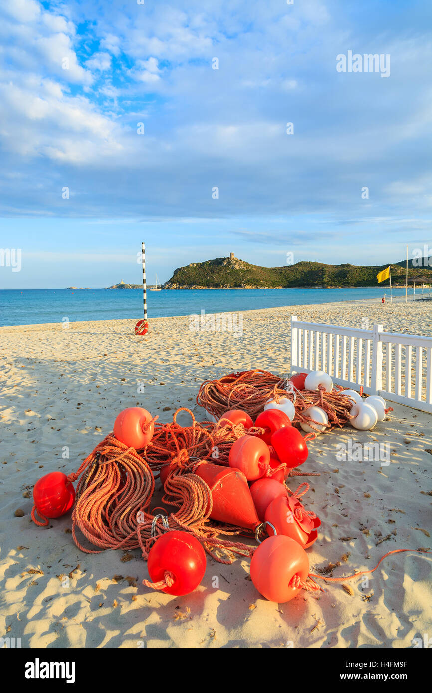 Swimming net with red buoys on sandy Porto Giunco beach, Villasimius, Sardinia island, Italy Stock Photo