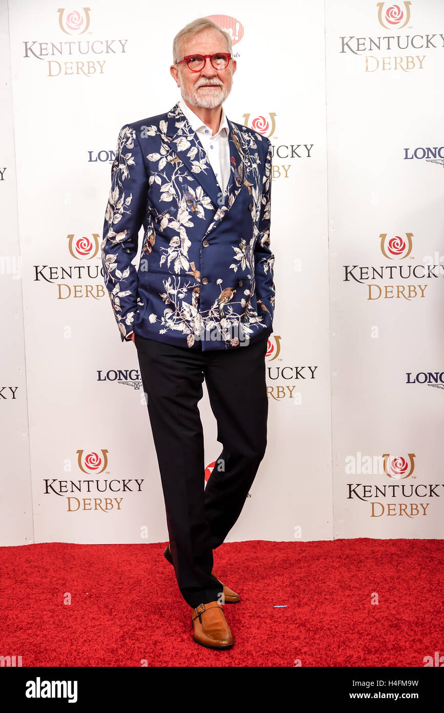 Steve Wilson owner of the 21C Hotels with blue floral jacket and red