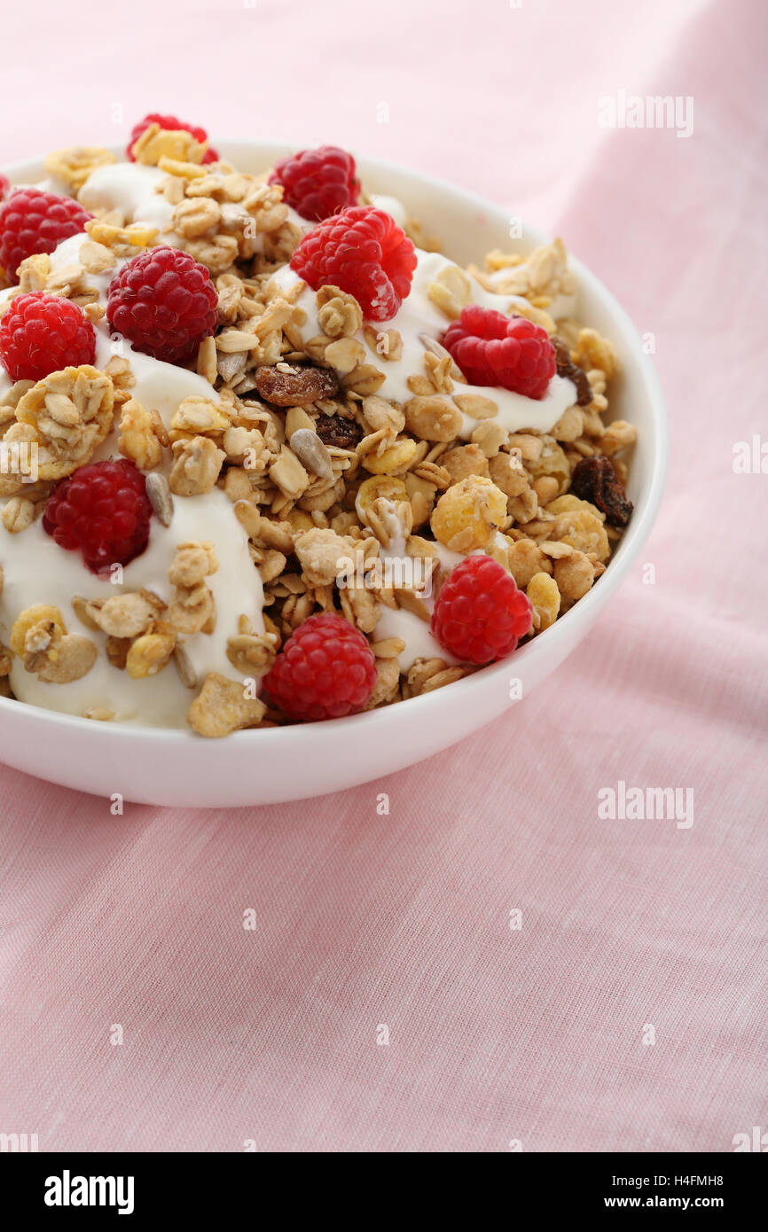 Breakfast bowl with muesli, food close-up Stock Photo