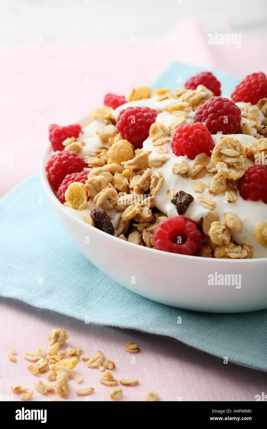 Breakfast bowl with raspberry, food closeup Stock Photo