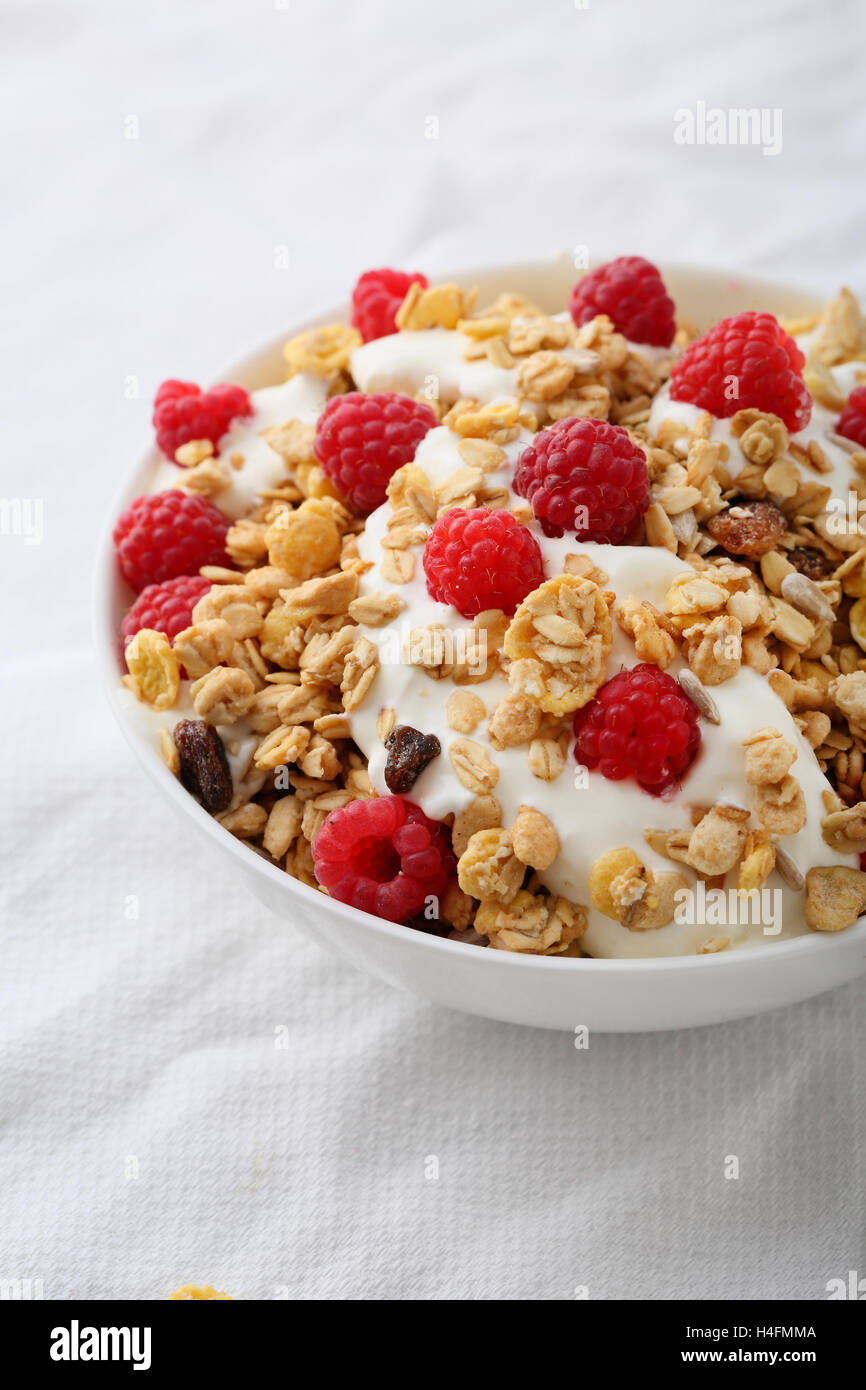 Breakfast muesli with berry, food close-up Stock Photo