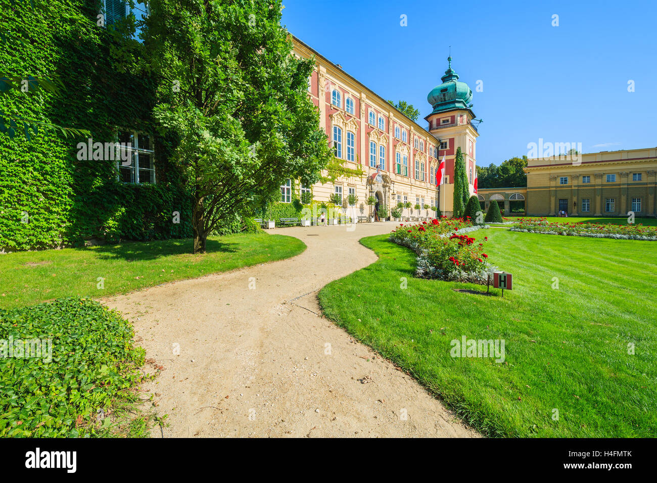 Gardens of beautiful Lancut castle on sunny summer day, Poland Stock Photo