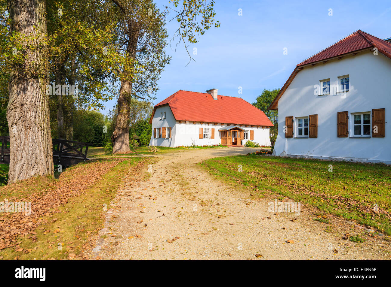 Traditional cottage houses in rural area of Radziejowice village, Poland Stock Photo