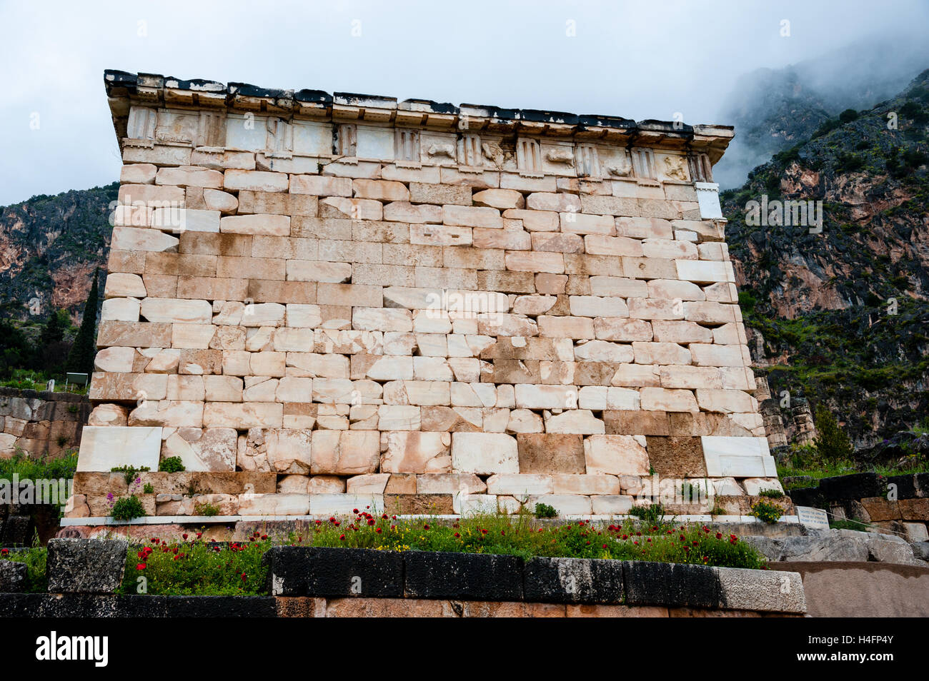 Delphi, Greece. In Greek mythology the site of the Delphic oracle. The Athenian Treasury. Stock Photo