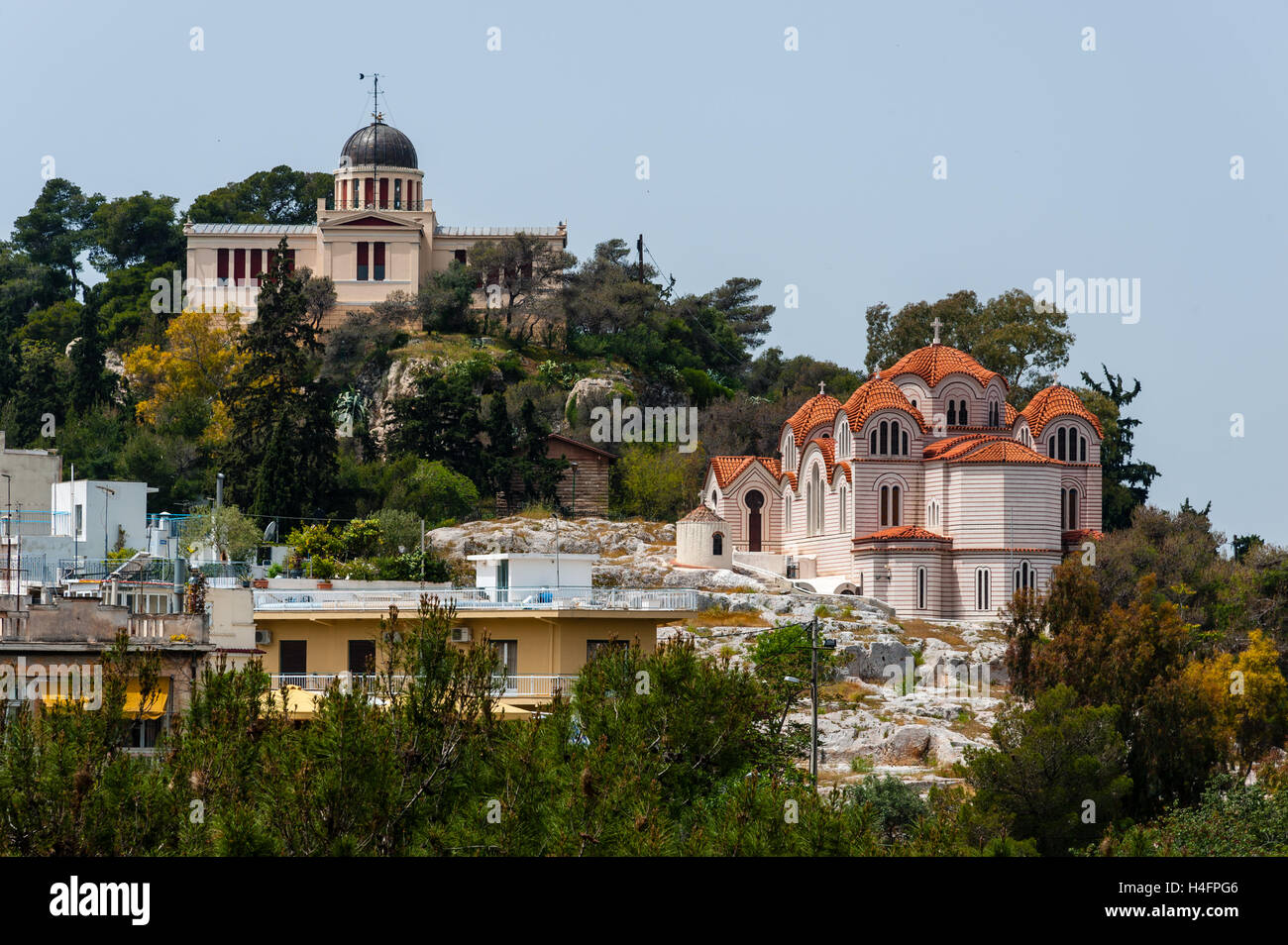 Athens, Greece. View from Areopagus below the Acropolis.  The National Observatory of Athens and Agia Marina church. Stock Photo