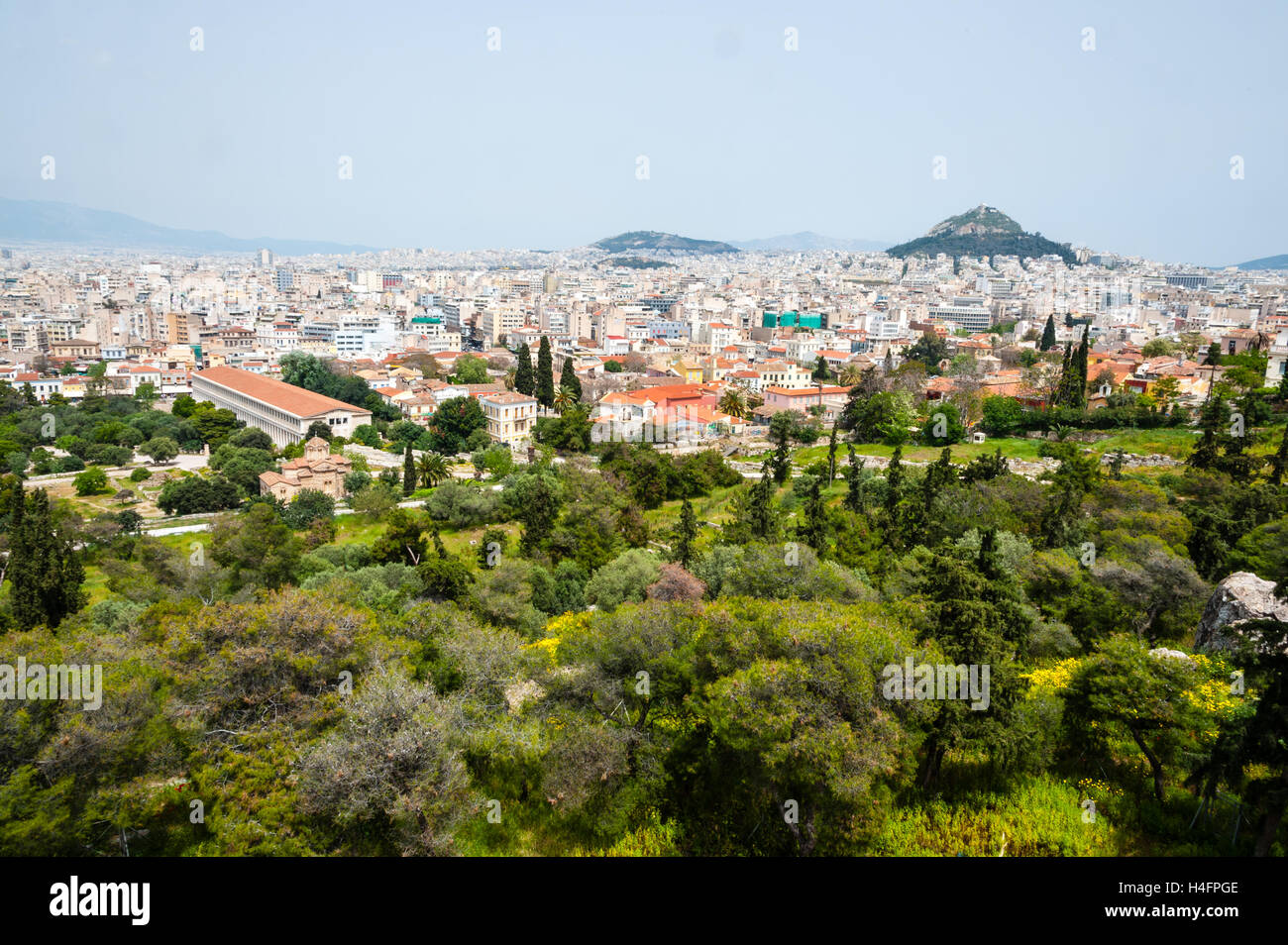 Athens, Greece. View from Areopagus below the Acropolis.  With the Stoa of Attalos and Mount Lycabettus. Stock Photo