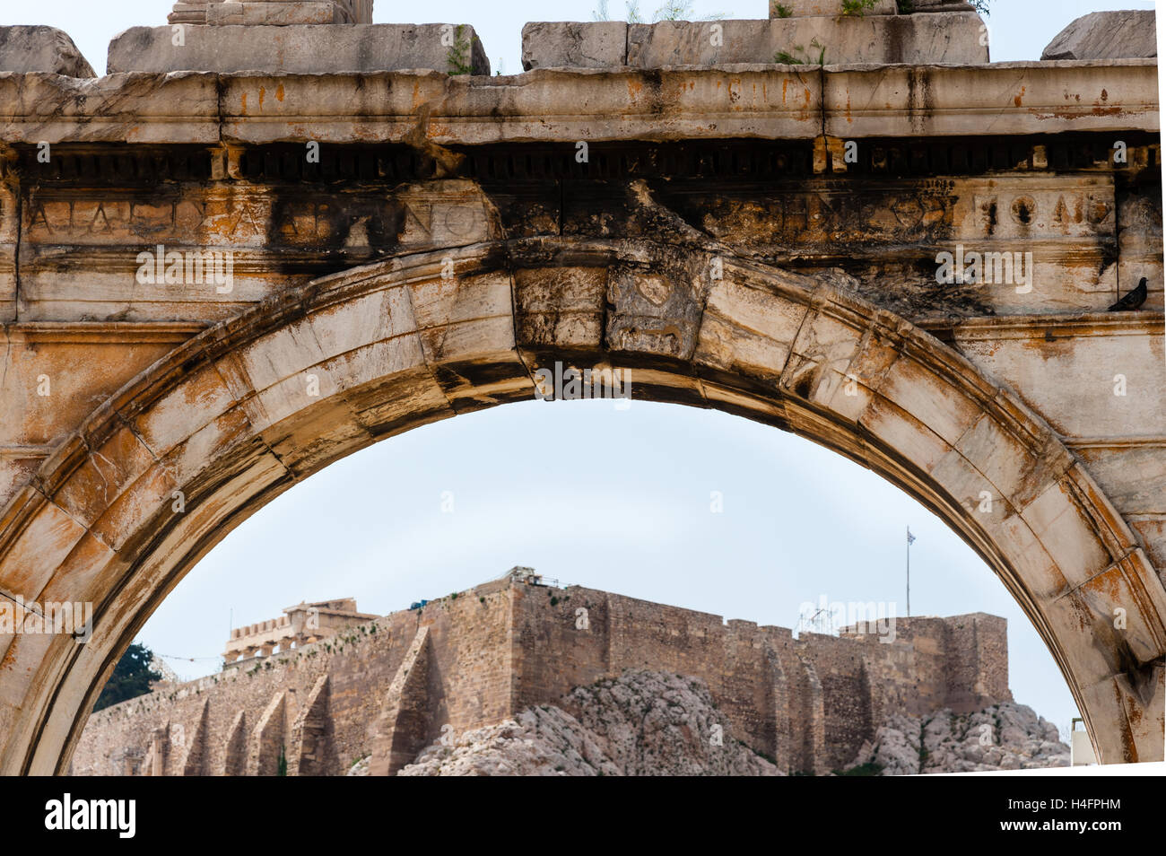 Athens, Greece. The Arch of Hadrian with Acropolis in the background. Stock Photo