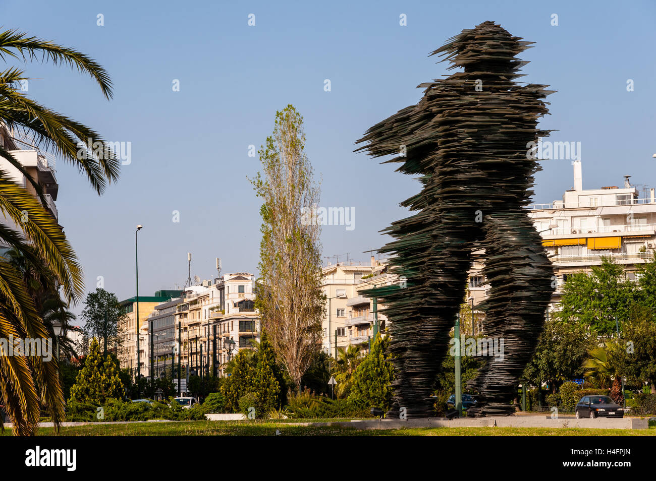 Athens, Greece.The 'Running Man', a sculpture made of glass. Stock Photo