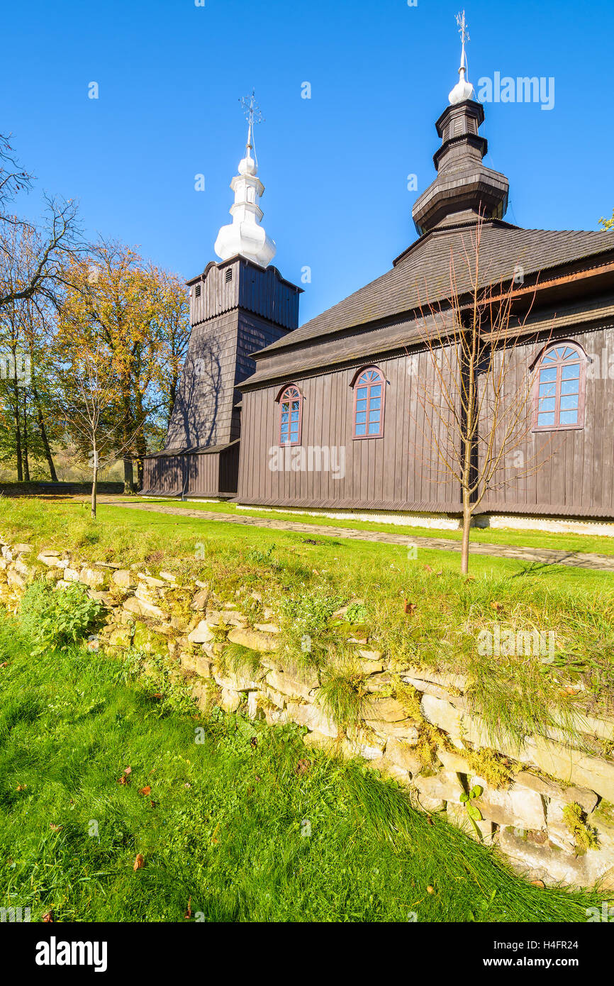 Old wooden orthodox catholic church in Brunary village on sunny autumn day, Beskid Niski Mountains, Poland Stock Photo