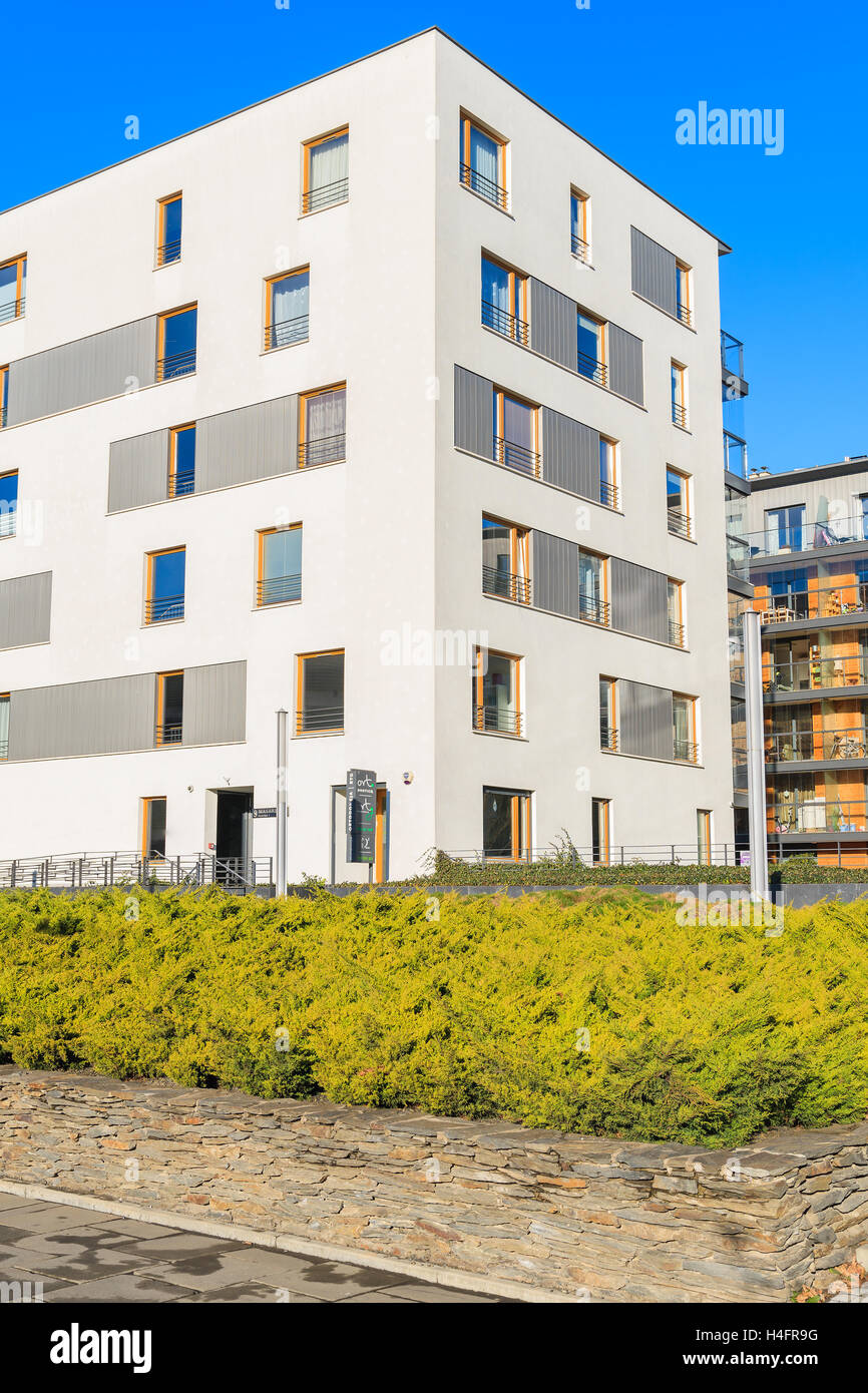 KRAKOW, POLAND - DEC 12, 2014: modern white apartment building in Kazimierz district of Krakow. This area is becoming a fashionable place to live a it is close to tourist attractions of city center. Stock Photo