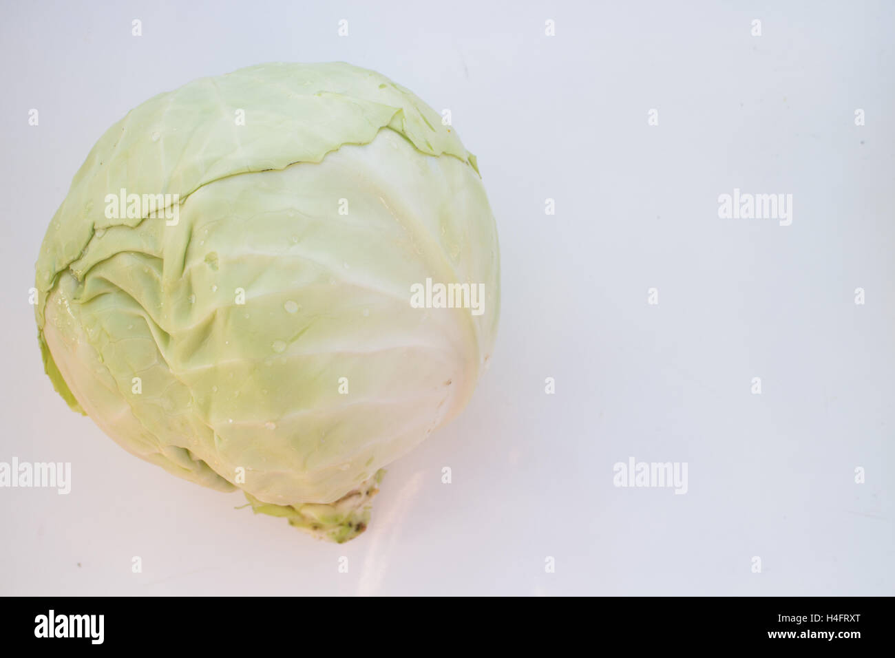 Head of green cabbage used for cooking or food, food inspired Stock Photo