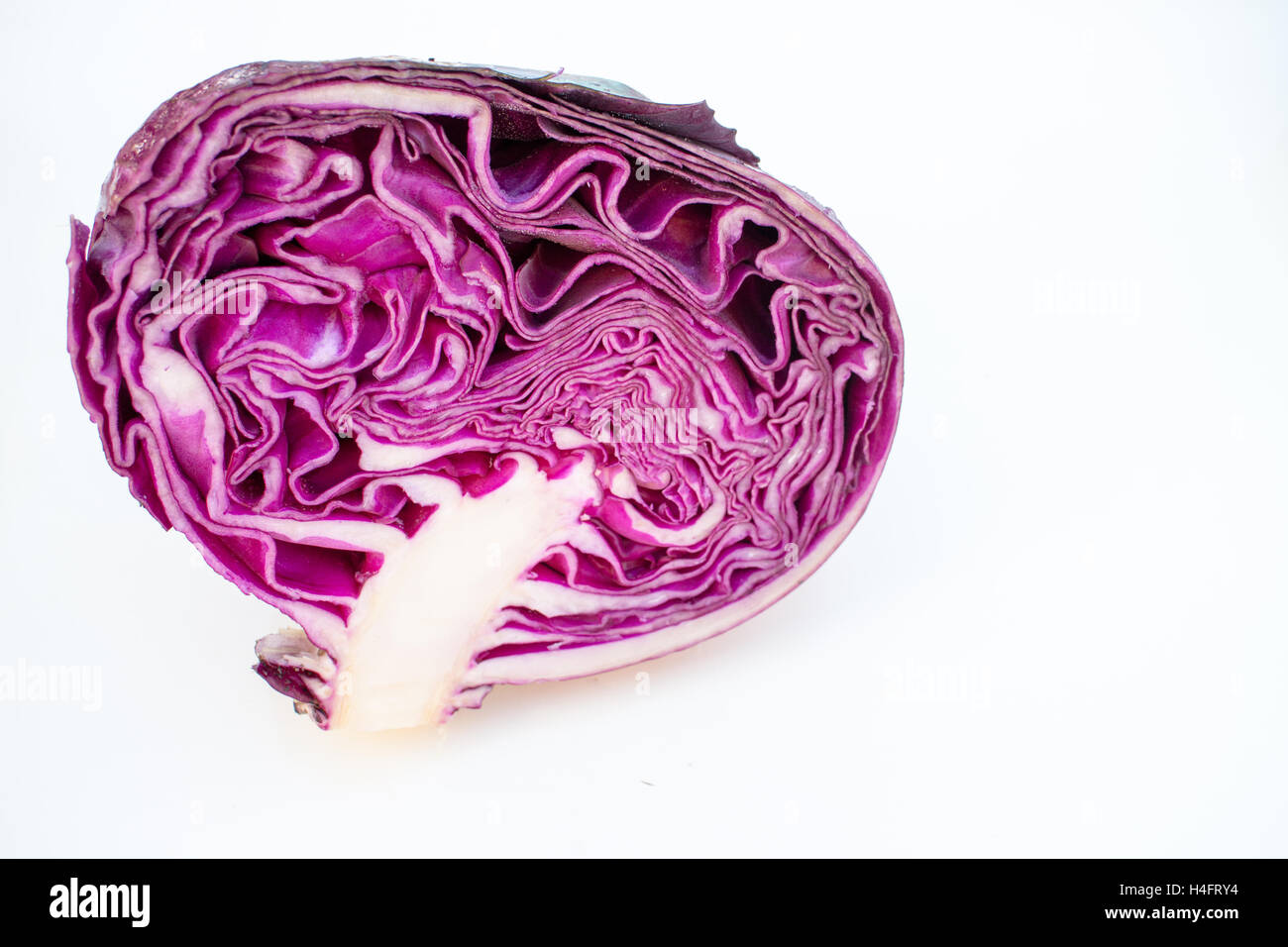 Half of a purple cabbage ready to be eaten, made into a creation, food inspired Stock Photo