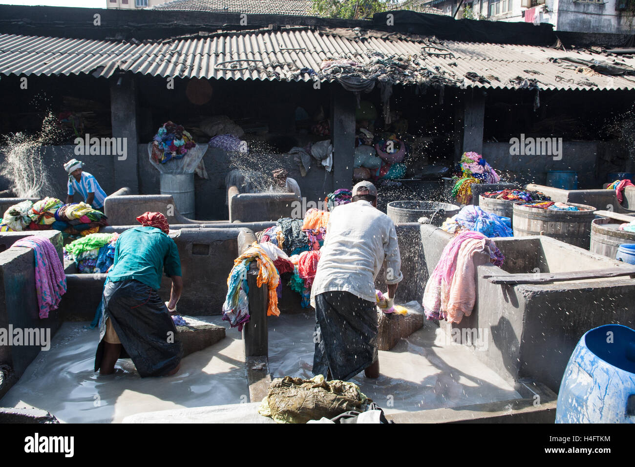 https://c8.alamy.com/comp/H4FTKM/washing-wash-day-hand-washing-laundry-and-hanging-clothes-at-dhobi-H4FTKM.jpg