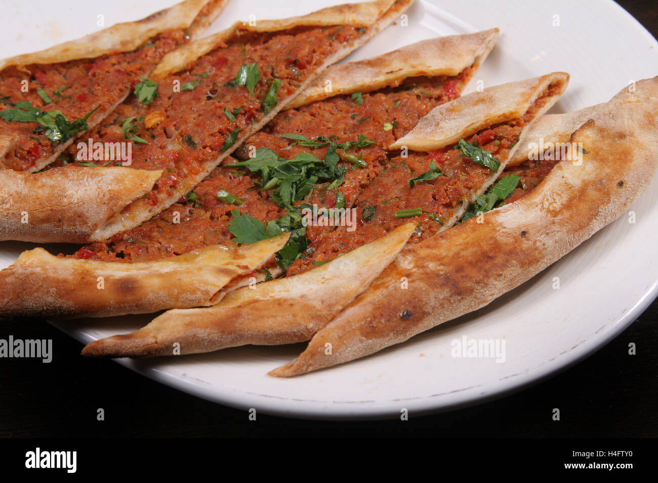 Turkish pizza (pide) with mınced meat Stock Photo
