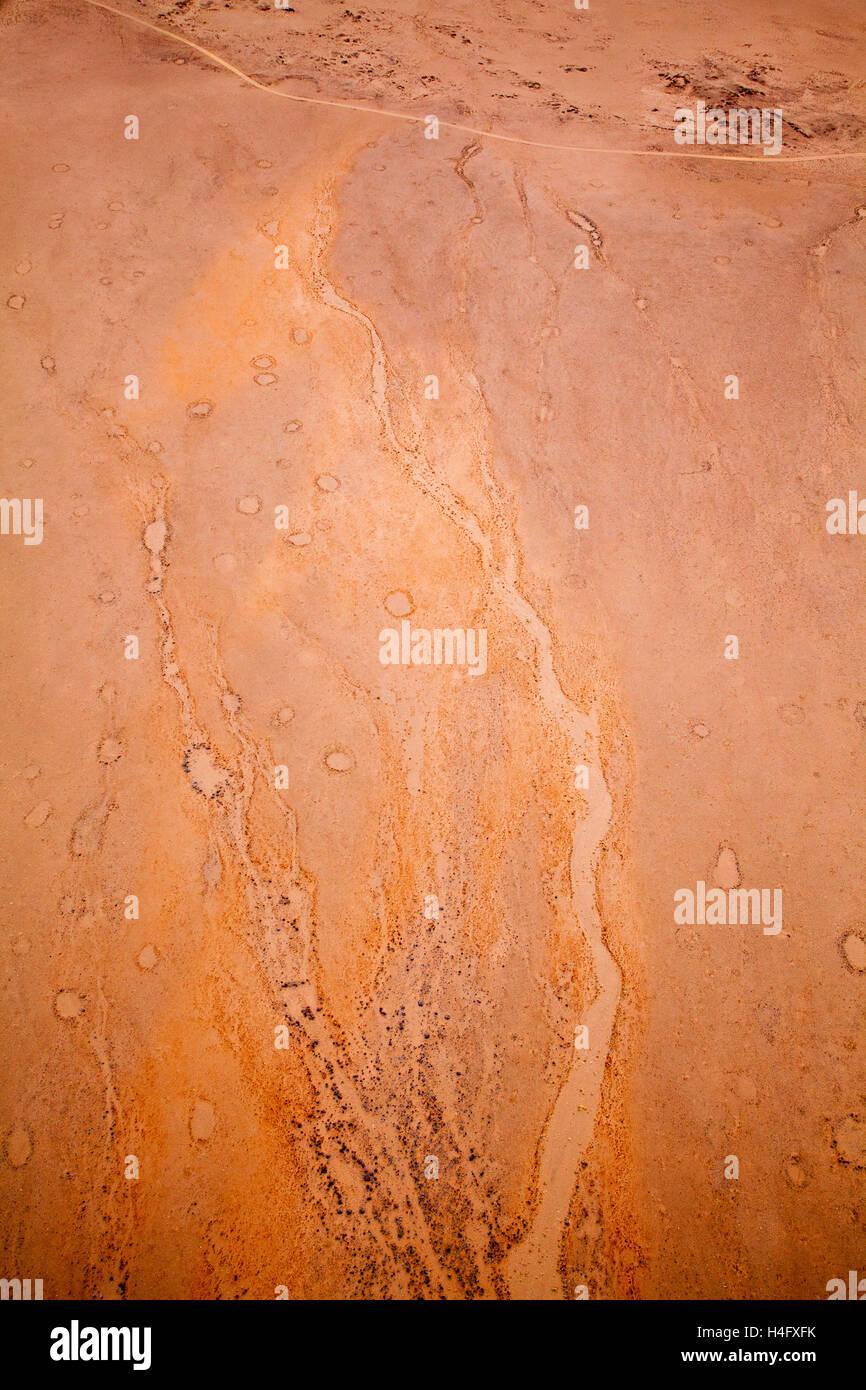 Fairy circles and dry watercourse seen from above while Hot air ballooning, Namib-Naukluft National Park, Namibia Stock Photo