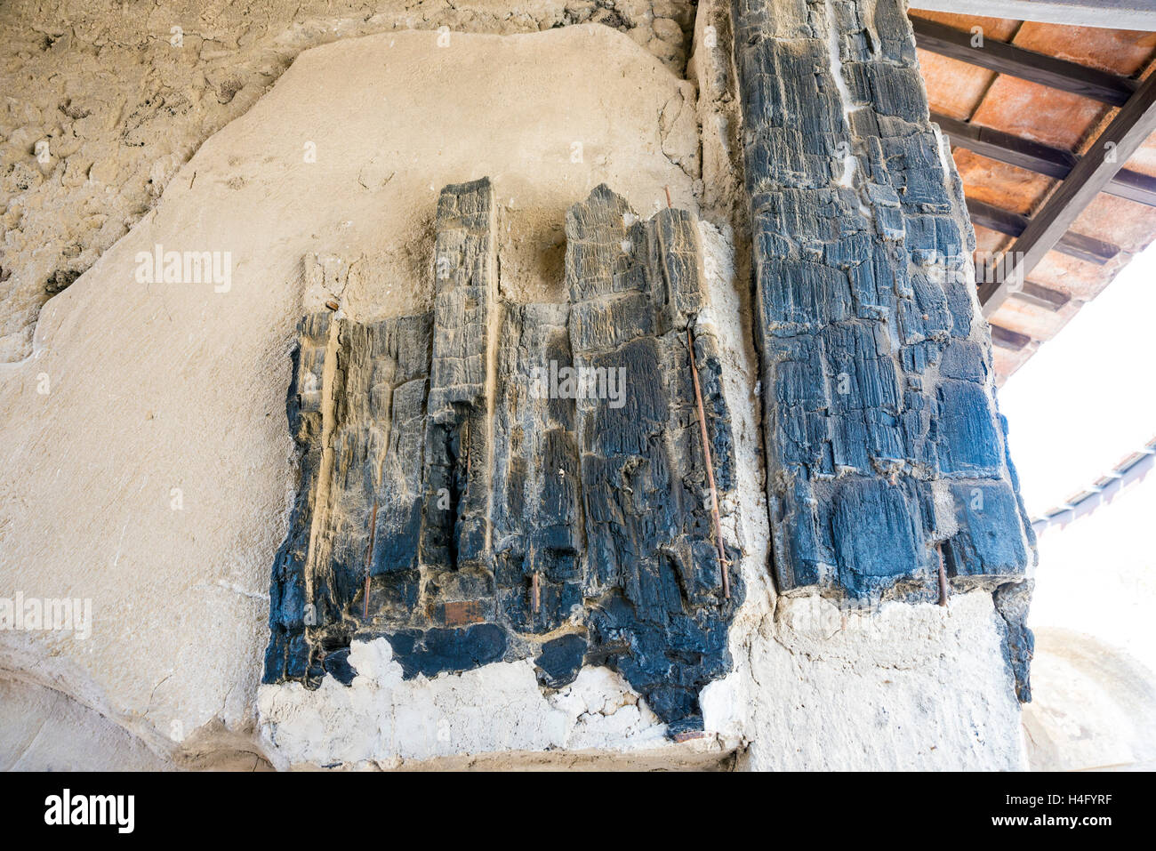 Ancient charred timbers in Herculaneum, near Naples, Italy Stock Photo