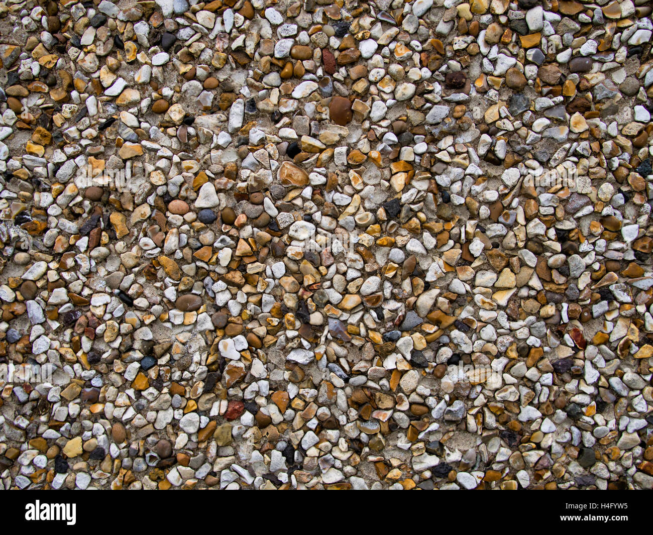 Pebbledash detail. Traditional material for cladding homes. Stock Photo