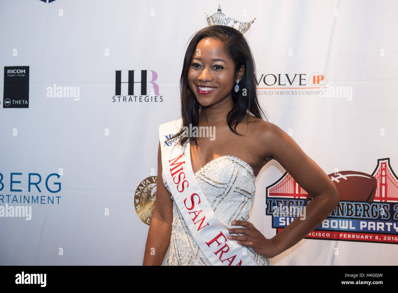 Miss San Francisco poses on the red carpet at the Leigh Steinberg Super