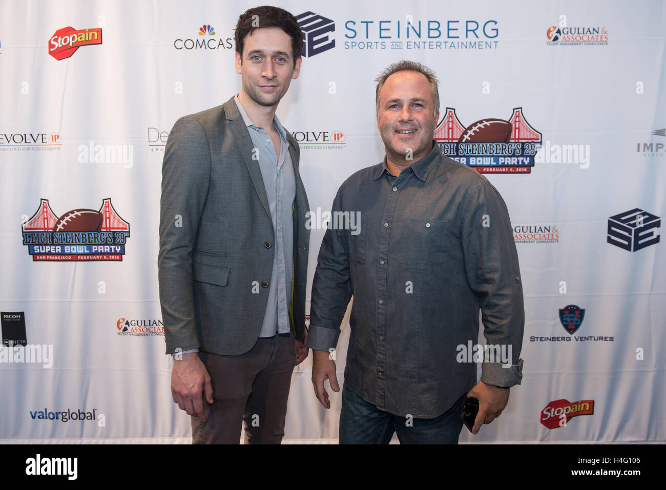 David Rudy poses on the red carpet at the Leigh Steinberg Super Bowl