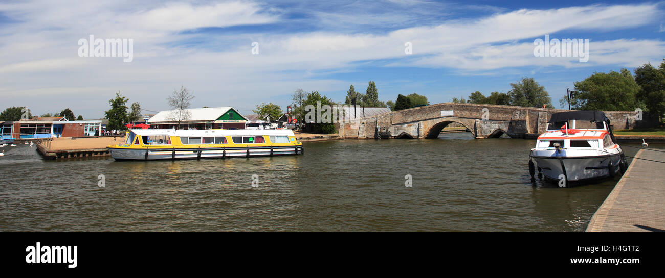 Summer view over boats at Potter Heigham village, river Thurne, Norfolk Broads National Park