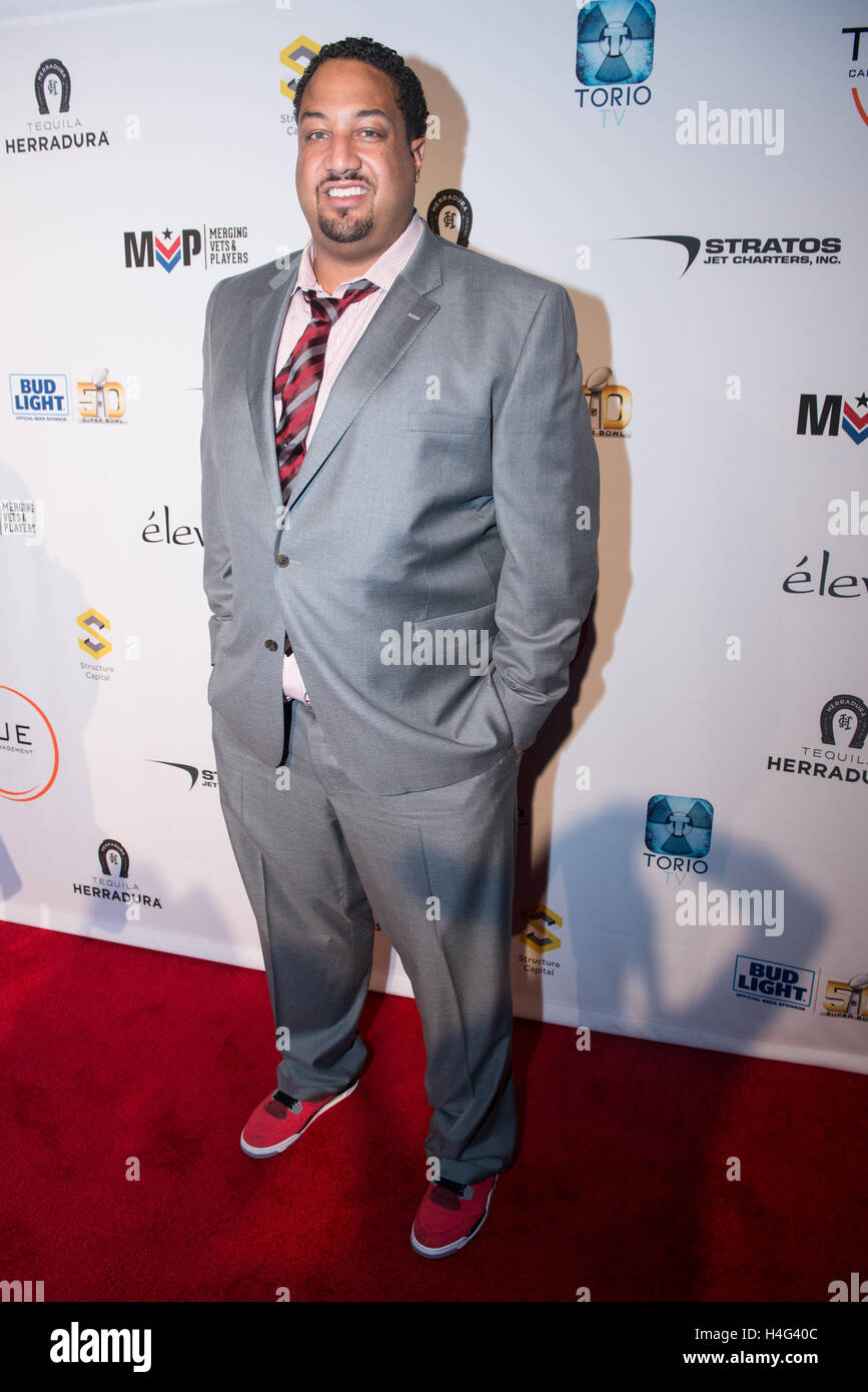 Langston Walker poses for a photo at the Glazer Palooza + Suits