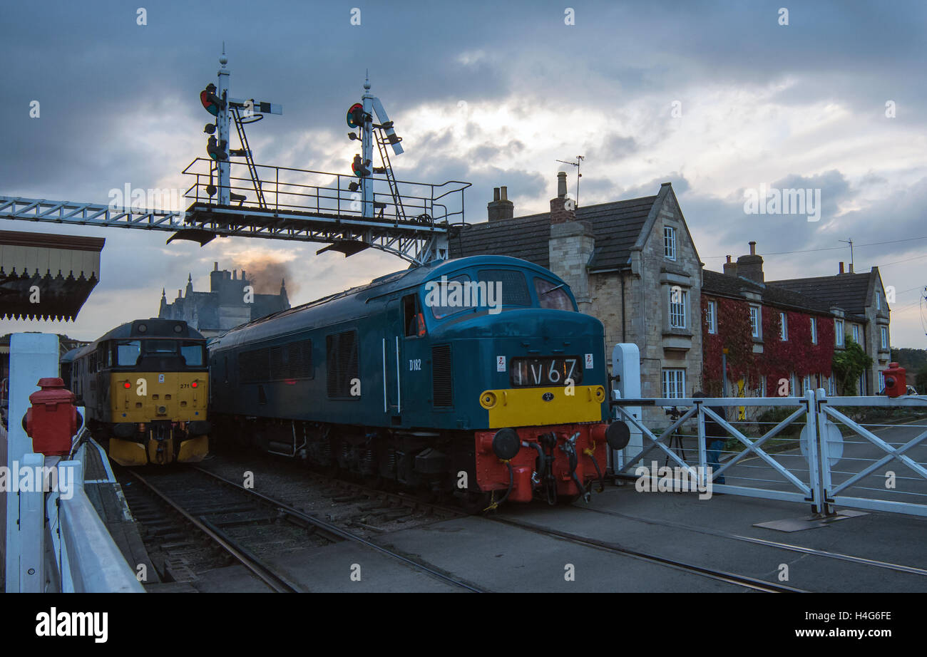 Nene Valley Railway Lincolnshire October 15th  2016: Orange skies and storm clouds, freeefall parachutist and classic engines at last light . Credit: Clifford Norton/Alamy Live News Stock Photo