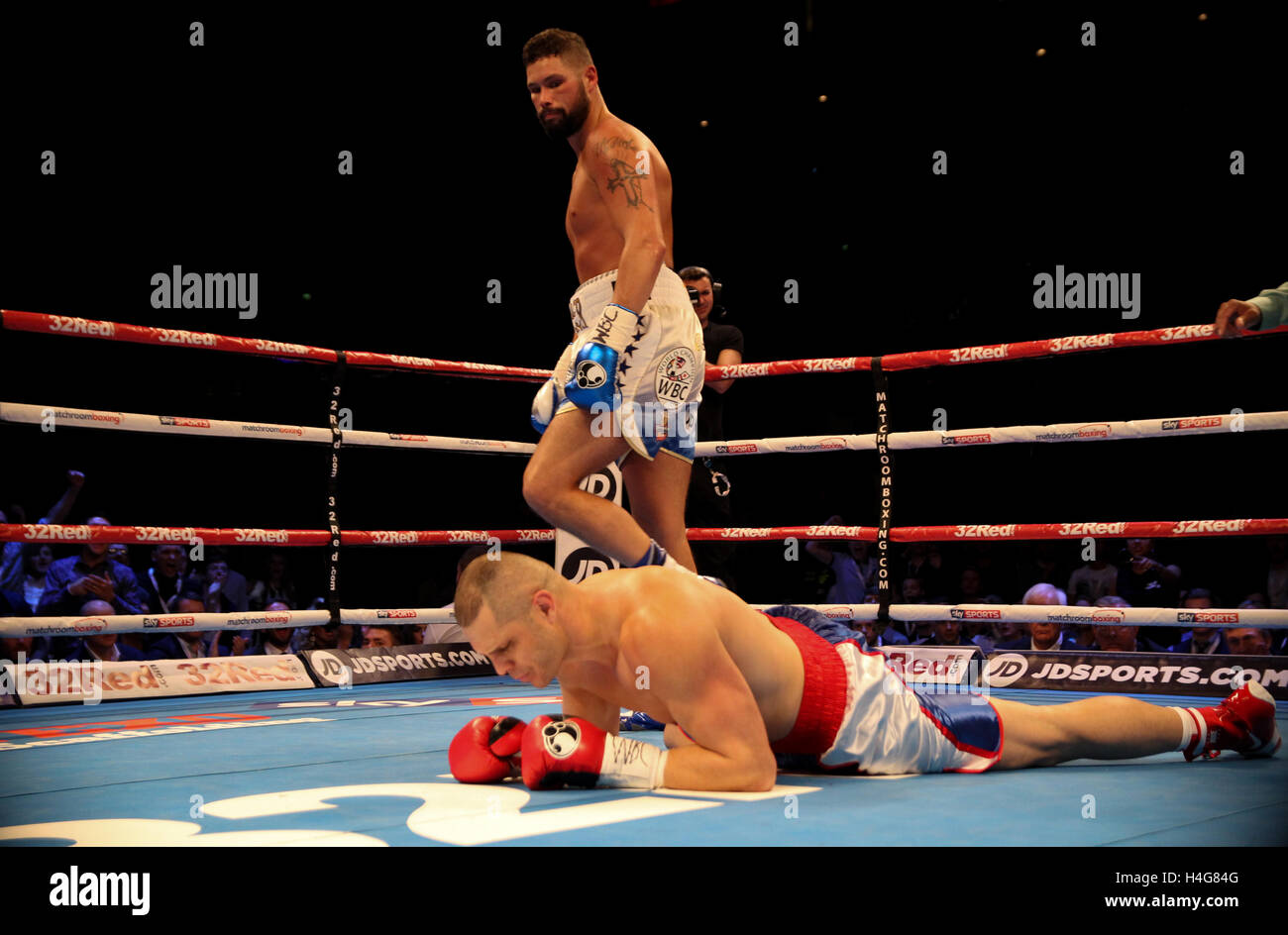Echo Arena, Liverpool , UK 15th October 2016. Tony Bellew v BJ Flores Matchroom Boxing Fight Night.  Tony Bellew (Liverpool)  knocks down  BJ Flores (USA) during their WBC World Cruiserweight  Championship bout at Echo Arena, Liverpool  Credit: Stephen Gaunt/Touchlinepics.com/Alamy Live News Stock Photo