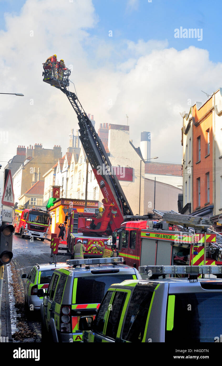 Bristol, UK. 16th October, 2016. St Michael's on the Mount Church Without, a grade II listed building from the seventeen hundreds in central Bristol, England, UK, located on St Michael's Hill,  16 October 2016.  Multiple fire engines including two ladder rigs, a number of ambulances and police attended the fire. The church has been boarded up for 17 years with temporary uses during this time but had squatters and graffiti taggers broke in a few days ago.  The roof and much of interior has been destroyed. The cause of the fire is not yet known. Credit: Charles Stirling/Alamy Live News Stock Photo