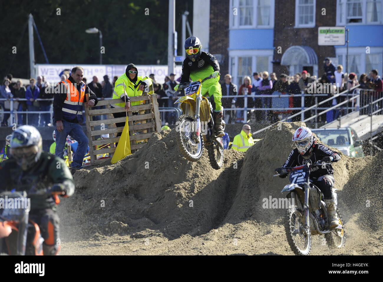 Weymouth, Dorset, UK.  16th October 2016. Competitors on their bikes testing themselves on the demanding circuit  of the Weymouth Lions Beach Motocross.  Photo by Graham Hunt/Alamy Live News Stock Photo