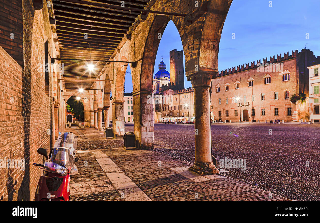 Mantua Ducale Palace at Sordolle square from inside colonnade towards cathedral tower and palaces Stock Photo